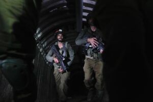 IDF soldiers move through a Hamas tunnel