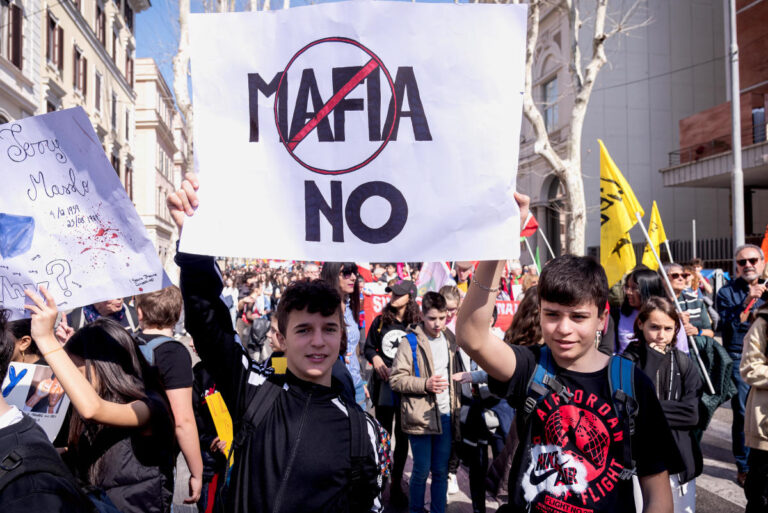 Italy expands controversial program to take kids from mafia families