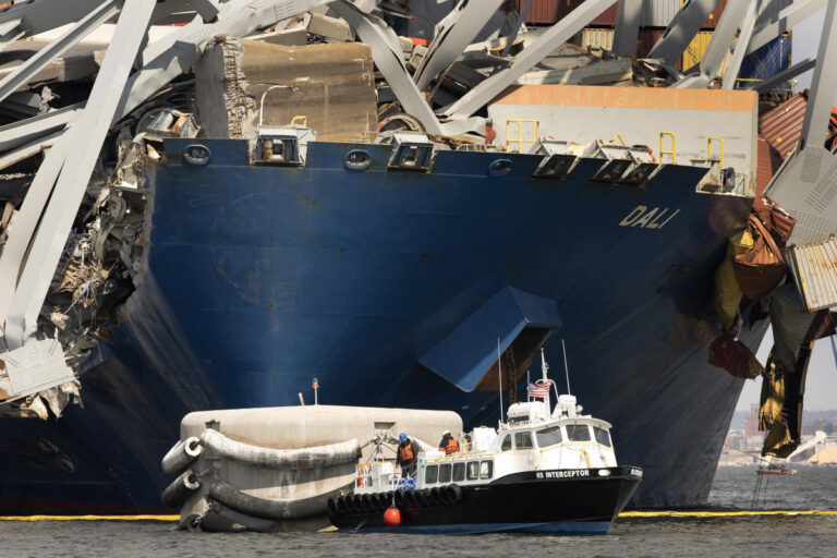 Key Bridge wreckage removal process begins, officials reduce pressure of underwater pipeline