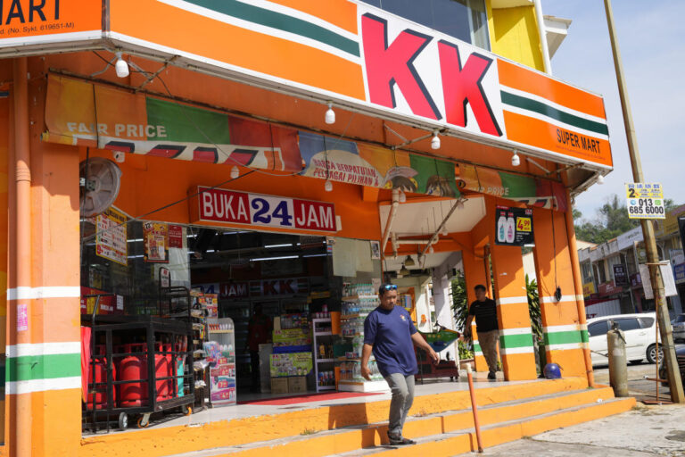 Malaysian convenience store owners charged over 'Allah' socks that angered Muslims