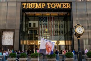 FILE PHOTO: A flag depicting former U.S. President Trump is placed at Trump Tower in New York City