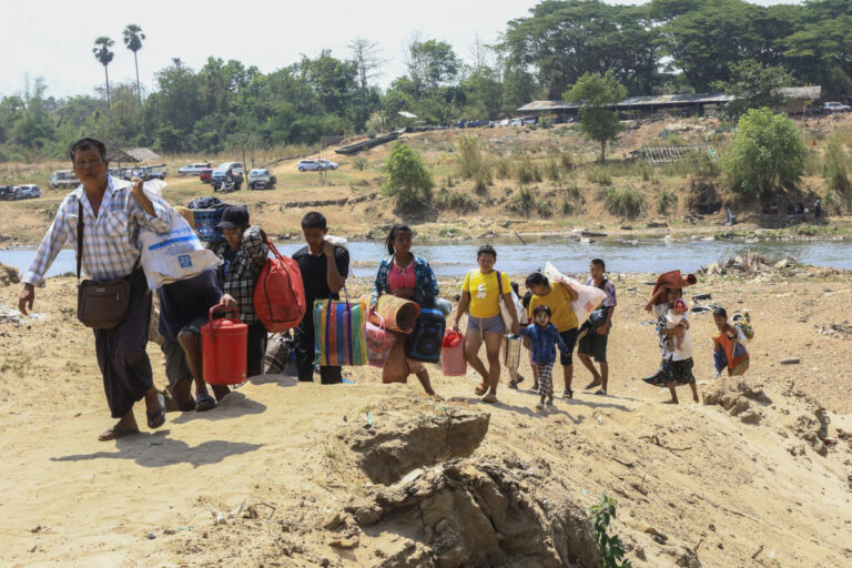 About 1,300 people from Myanmar flee into Thailand after clashes broke out in a key border town