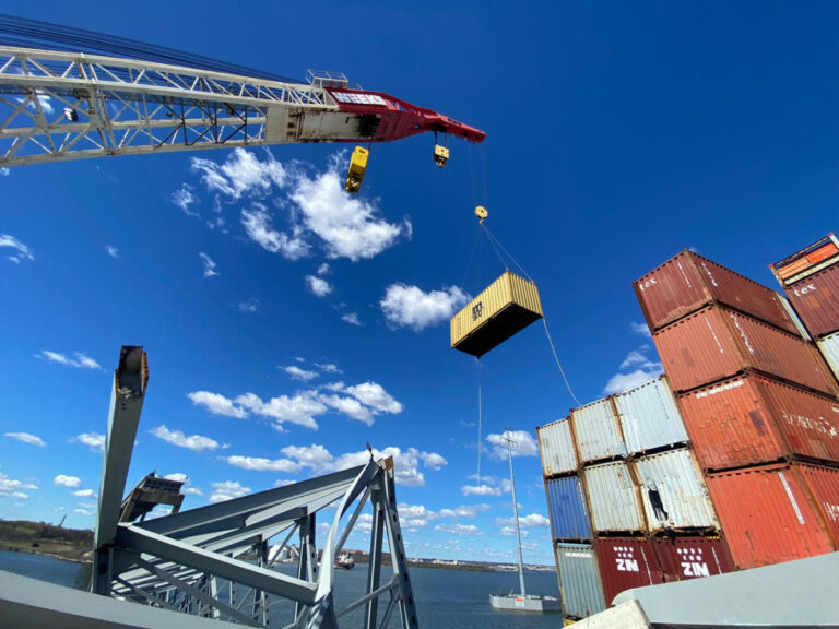 Crews begin removing shipping containers off the Dali, ship that collapsed Key Bridge