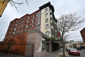 Former Main St. hotel to get $9.6M from state for affordable units