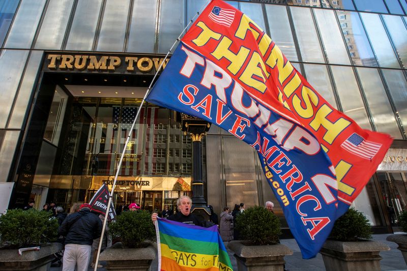 FILE PHOTO: Supporters of former U.S. President Trump gather at Trump Tower in New York