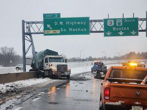 Major New Hampshire highway shut down after truck crash damages overhead sign