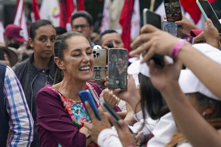 Mexico's leading presidential candidate stopped by masked men who ask for help in stemming violence