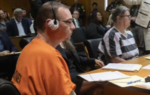 Parents of Michigan school shooter are each sentenced to 10 to 15 years in prison