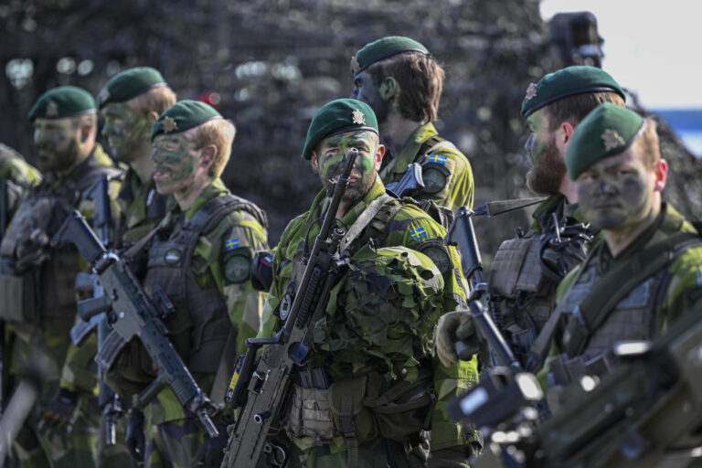 Sweden should spend more on defense and increase the number of conscripts, lawmakers recommend