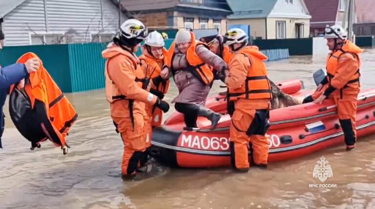 Thousands are evacuated after floods break a dam in the Russian city of Orsk