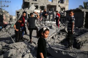 Palestinians are inspecting the damage in the rubble of the Al-Bashir mosque following Israeli bombardment in Deir al-Balah, central Gaza Strip, on April 2, 2024, amid ongoing battles between Israel and the Palestinian militant group Hamas. (Photo by Majdi Fathi/NurPhoto via Getty Images)