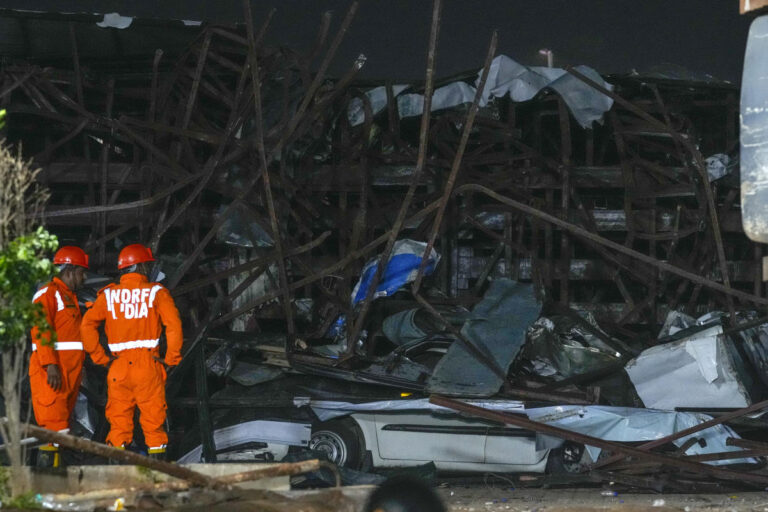 Billboard collapses onto people in Mumbai, India, killing at least 14 but others may be trapped