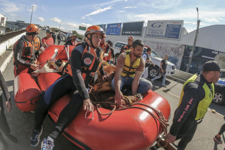 'Caramelo,' the Brazilian horse stranded on a roof by floods, is rescued after stirring the nation