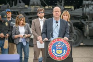 Colorado governor comes to Pueblo, signs bill creating new railroad safety protections