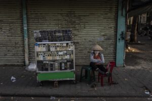 E-waste is overflowing landfills. At one sprawling Vietnam market, workers recycle some of it