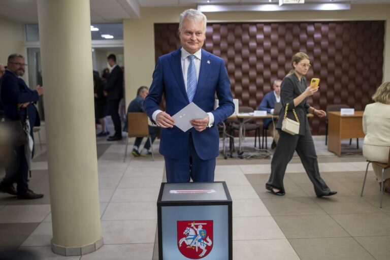 Lithuanians return to the polls with incumbent president favored to win 2nd election round