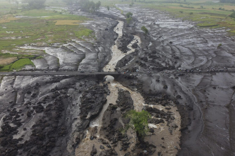 More bodies found in Indonesia after flash floods killed dozens and submerged homes