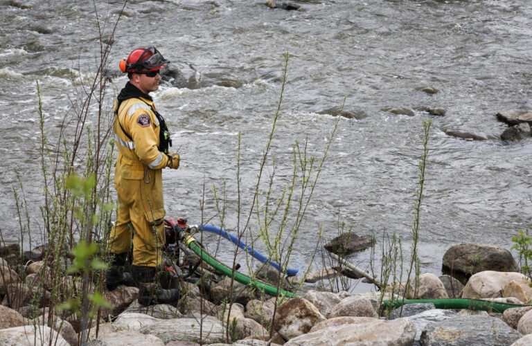 Wildfire near Canada's oil sands hub under control, Alberta officials say