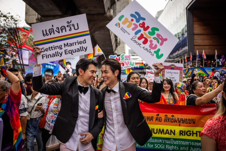 People carry a large rainbow-colored flag as they take part in the LGBTQ+ parade to mark the Pride Month celebrations in Bangkok, Thailand, on June 1, 2024. <span class="copyright">Anusak Laowilas—Getty Images</span>