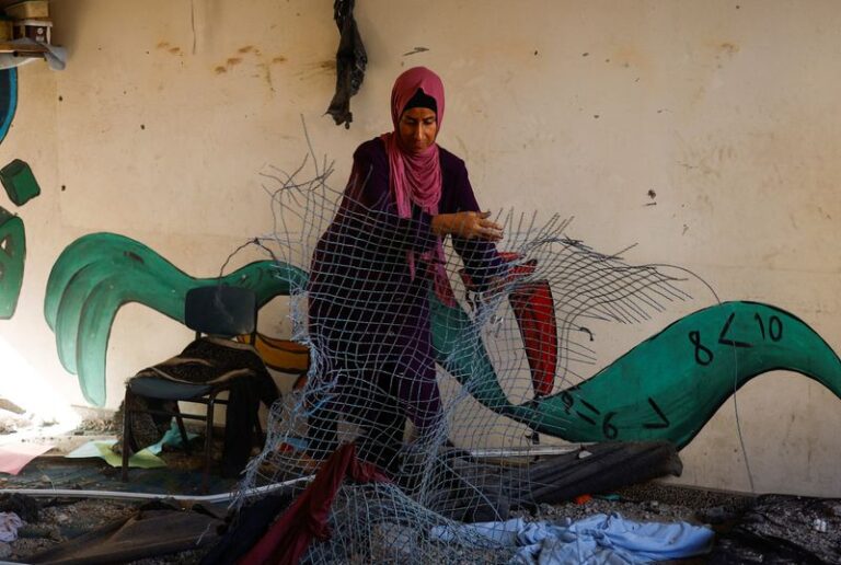 Aftermath of an air strike at a neighbouring house to a UNRWA school, in Khan Younis