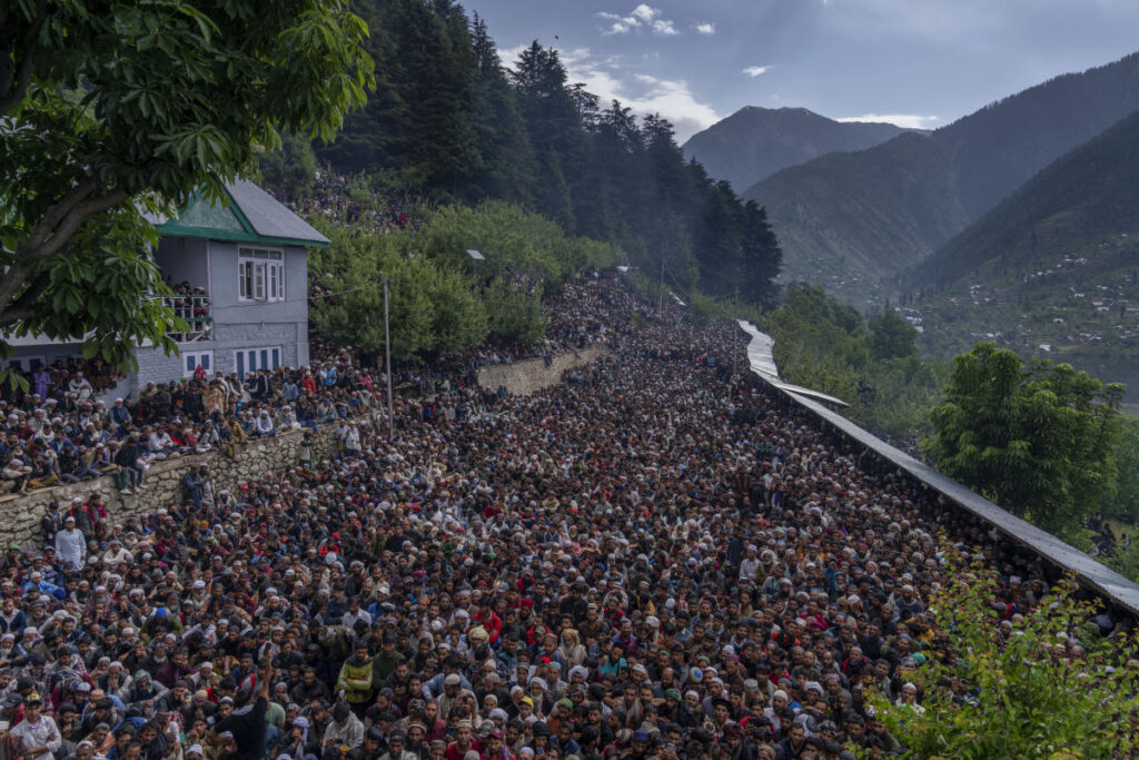 Nomadic Muslim devotees throng a forest shrine in disputed Kashmir